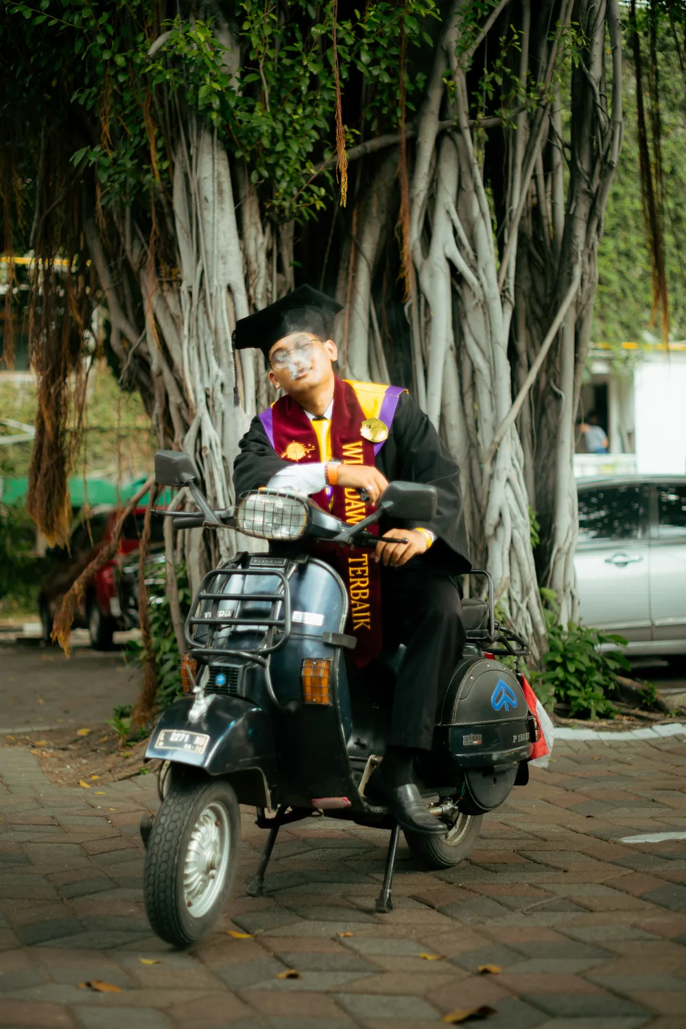 Cinematic graduation portrait at Widya Kartika Surabaya — Widya Kartika graduation photographer