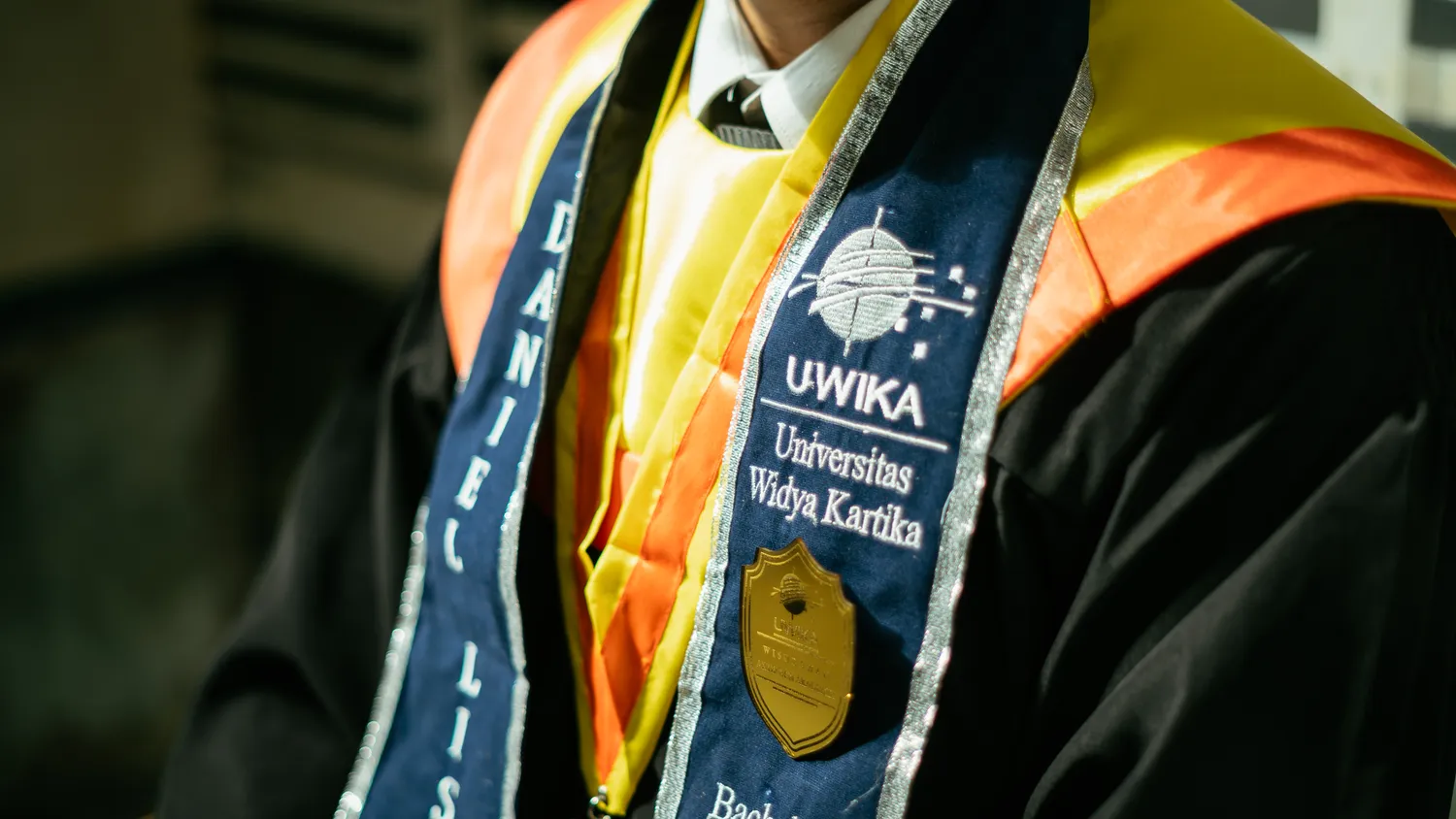 Graduation detail shot at Widya Kartika Surabaya — graduation photography services Surabaya